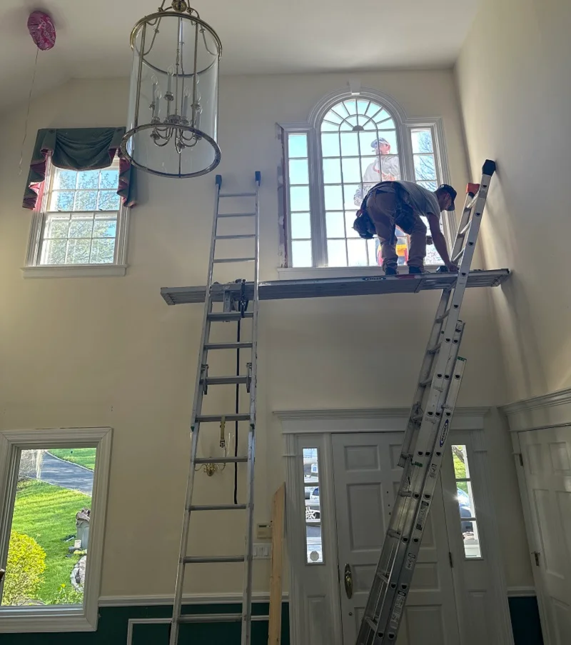 Scaffolding set up to replace this foyer window in New Canaan, CT